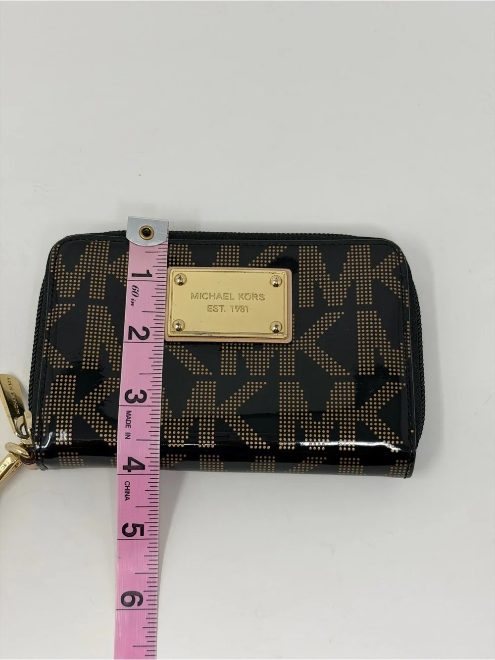 Michael Kors zip patent